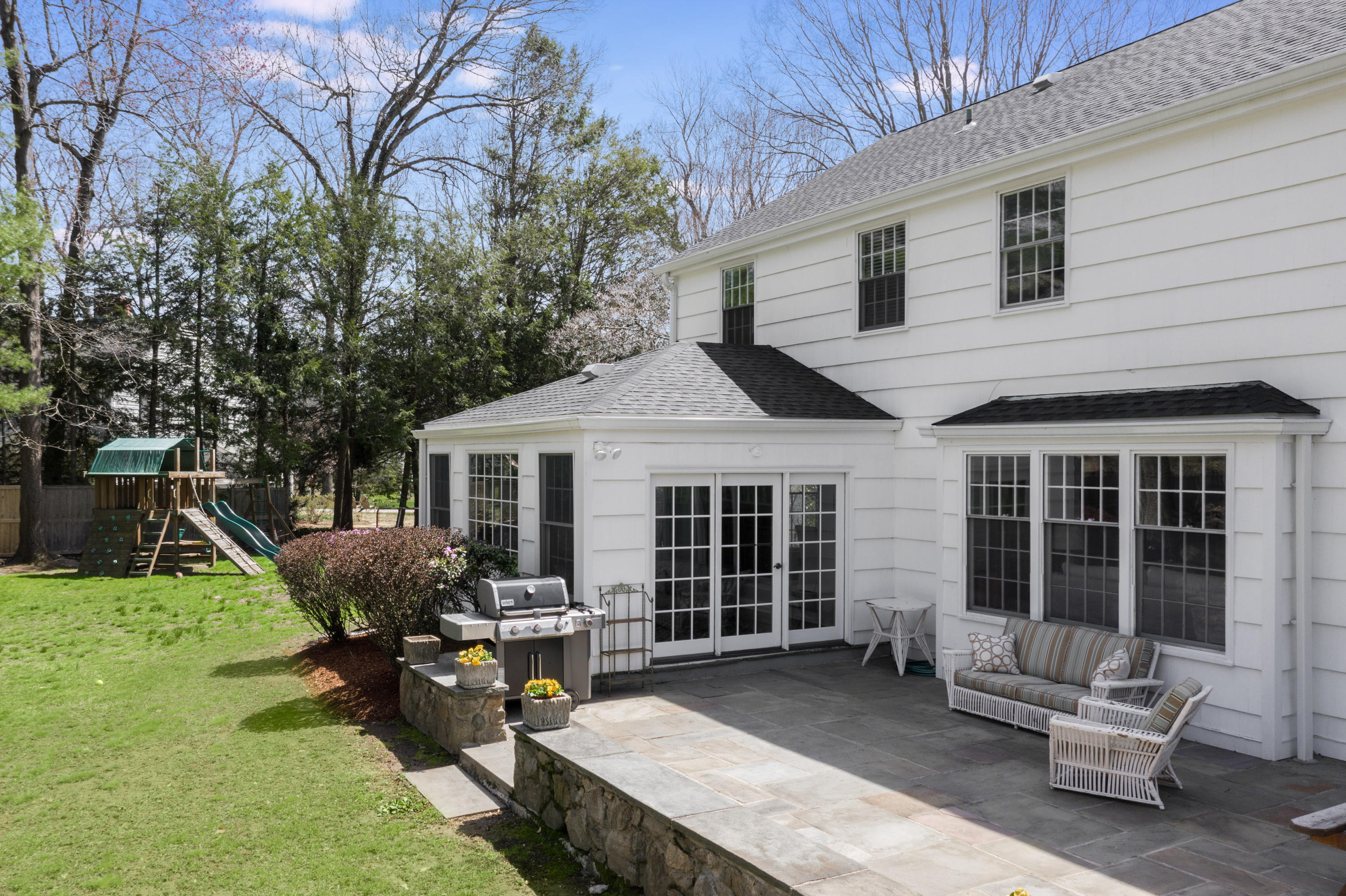 3 Haskell Lane Darien, CT 06820 - Photo 16 of 21 a view of a house with a backyard and sitting area