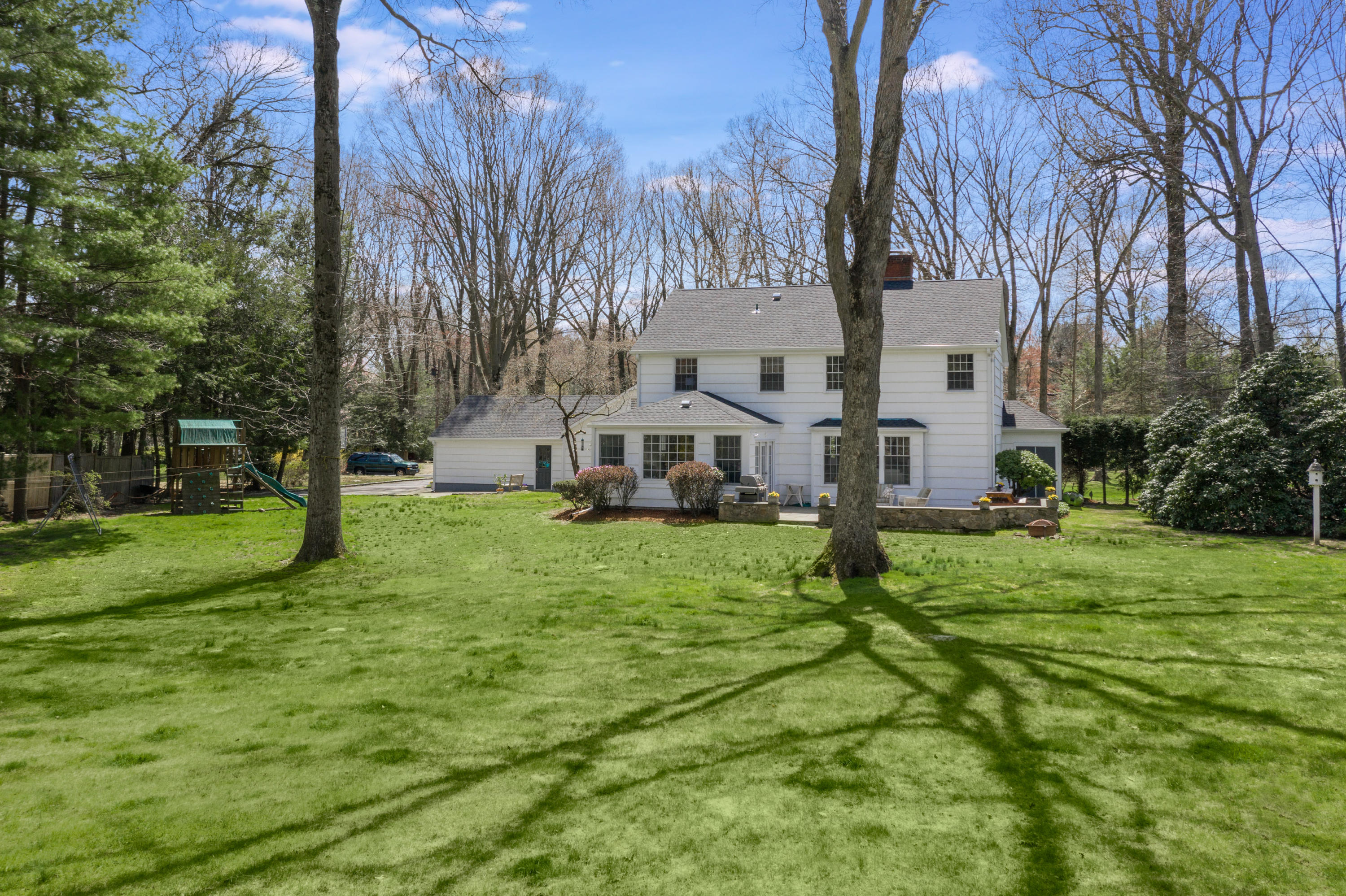 3 Haskell Lane Darien, CT 06820 - Photo 17 of 21 a view of a house with a yard