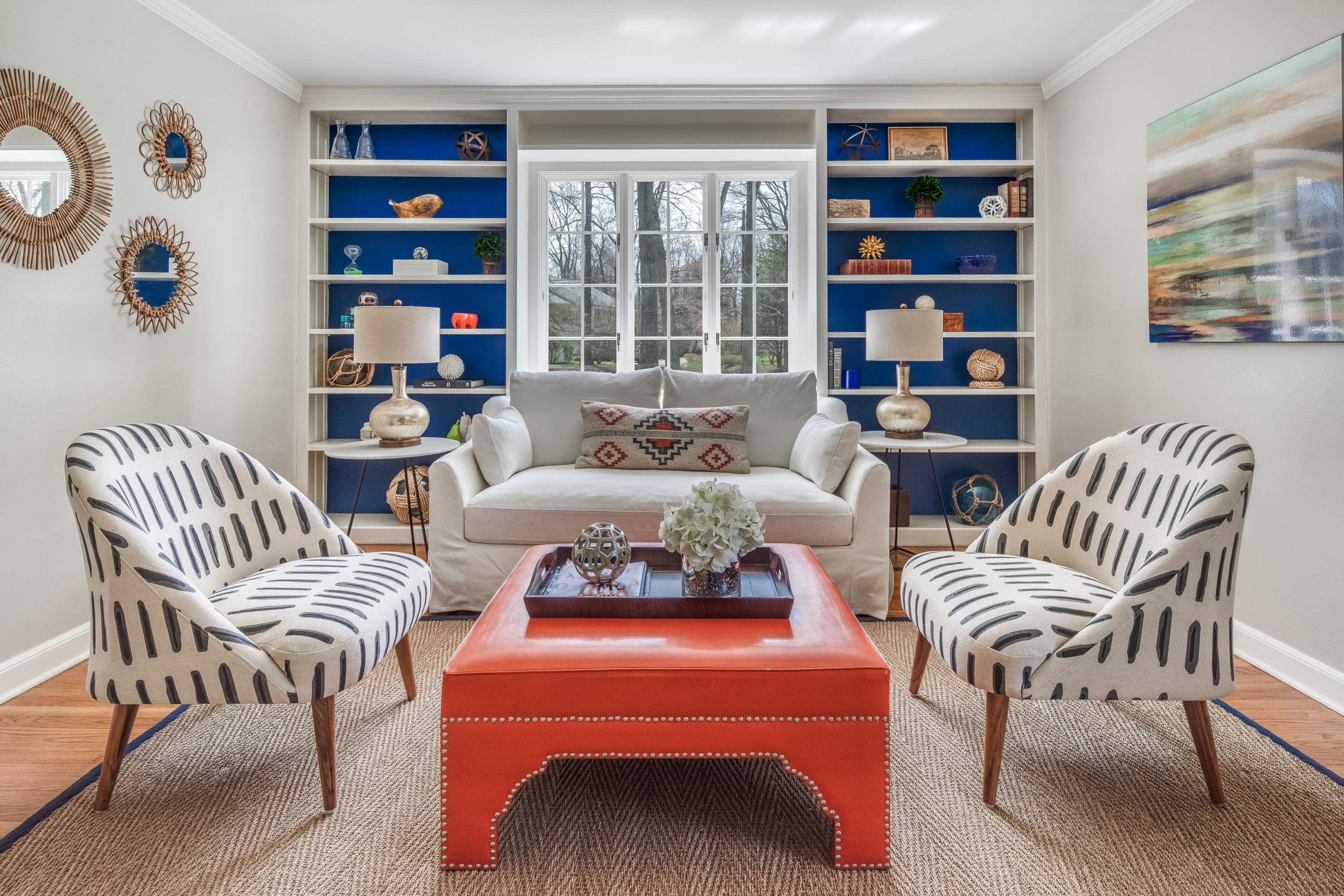 3 Haskell Lane Darien, CT 06820 - Photo 6 of 21 a living room with furniture a bookshelf and a large window