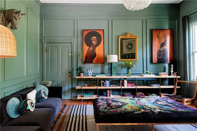 a living room with furniture or couch and a rug