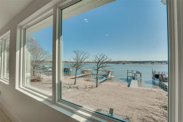 a view of a living room and a floor to ceiling window