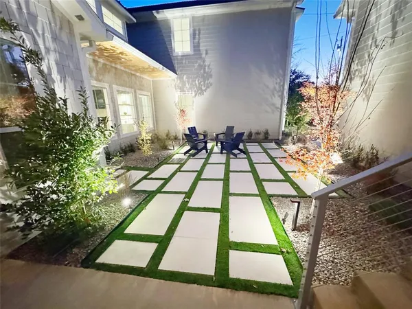 a view of backyard of a house