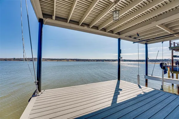 a view of a balcony with lake view