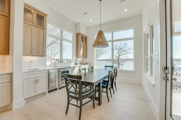a view of a dining room with furniture window and outside view