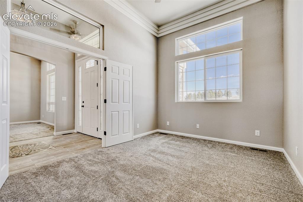 13680 Woodlake Road Elbert, CO 80106 - Photo 16 of 46 Secondary Bedroom #1 or Office off the front door with full bath.