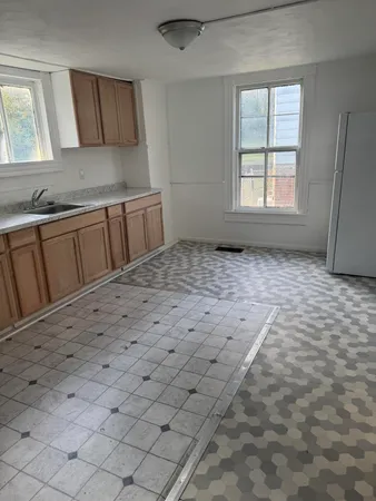 a view of a kitchen with cabinets