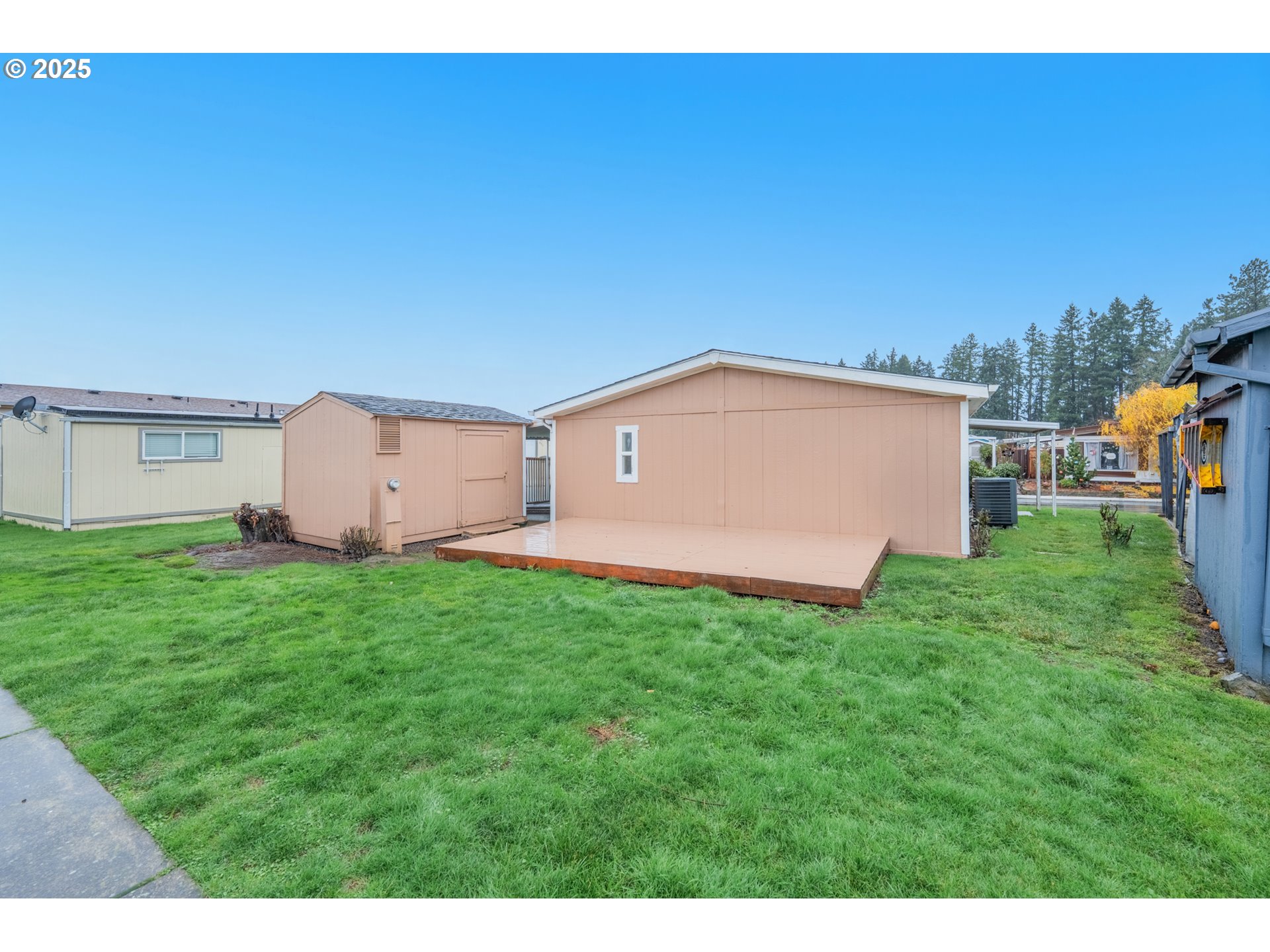 428 Southwest Boston Way, Unit 73 Beaverton, OR 97006 - Photo 22 of 25 a view of a backyard