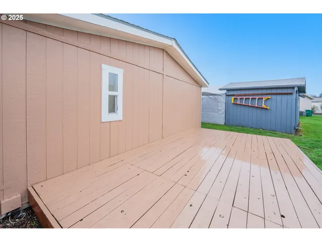 a view of wooden floor with a outdoor space