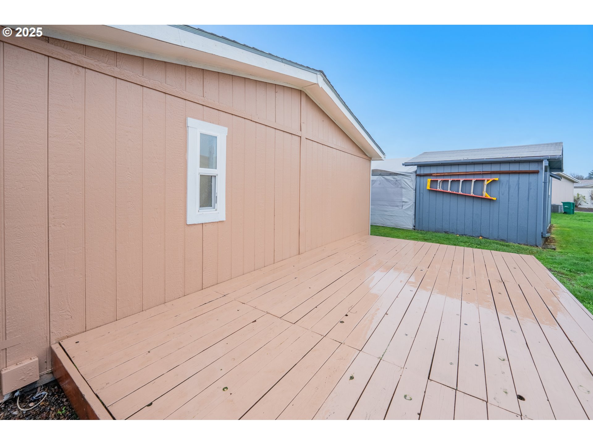 428 Southwest Boston Way, Unit 73 Beaverton, OR 97006 - Photo 23 of 25 a view of wooden floor with a outdoor space