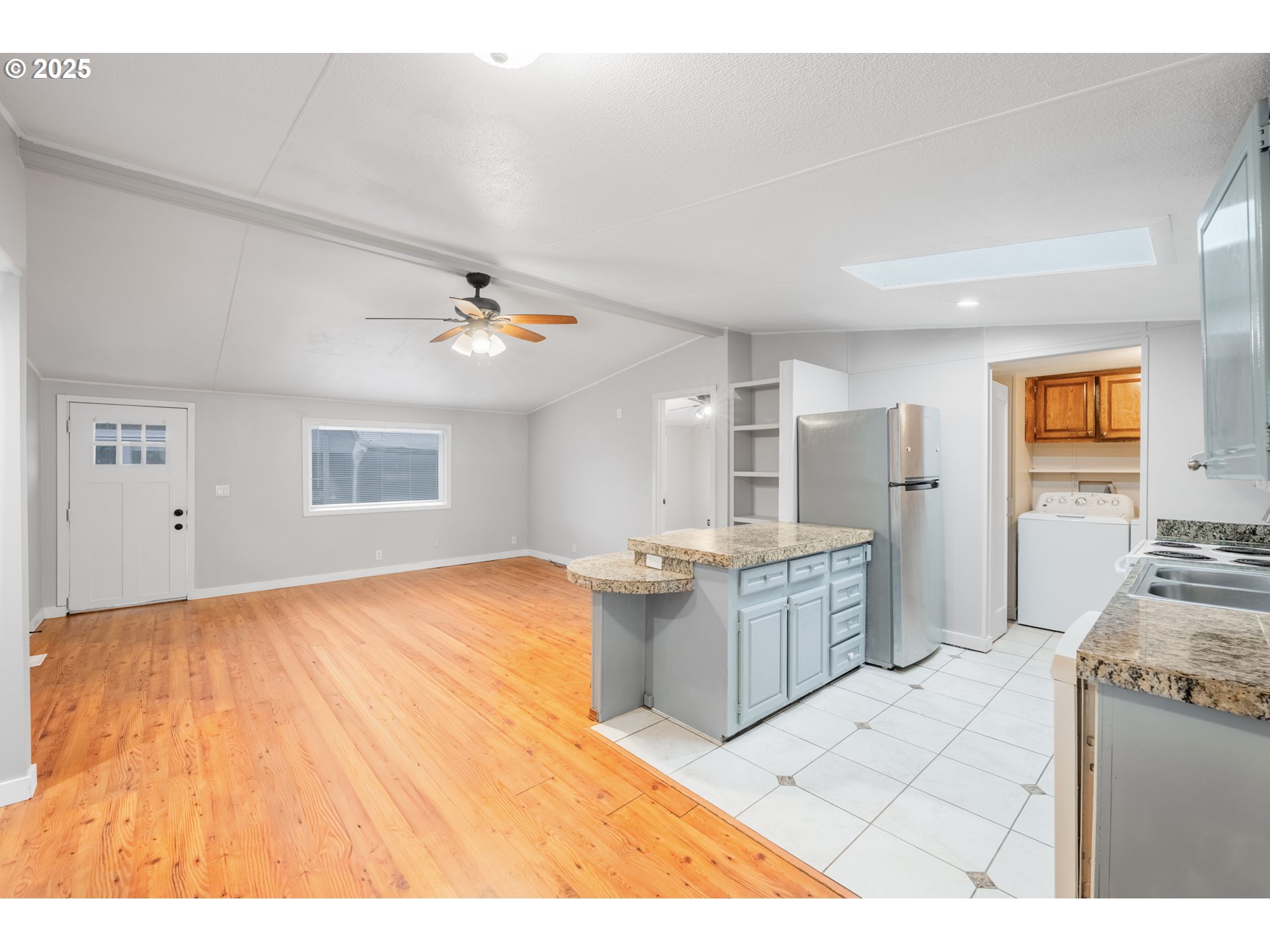 428 Southwest Boston Way, Unit 73 Beaverton, OR 97006 - Photo 8 of 25 a kitchen with a sink appliances and cabinets