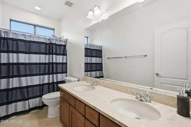 a view of a swimming pool with a yard