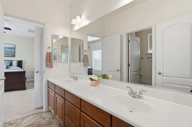 a view of a patio with table and chairs