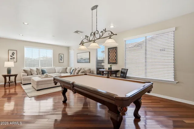 a view of a livingroom with furniture and window