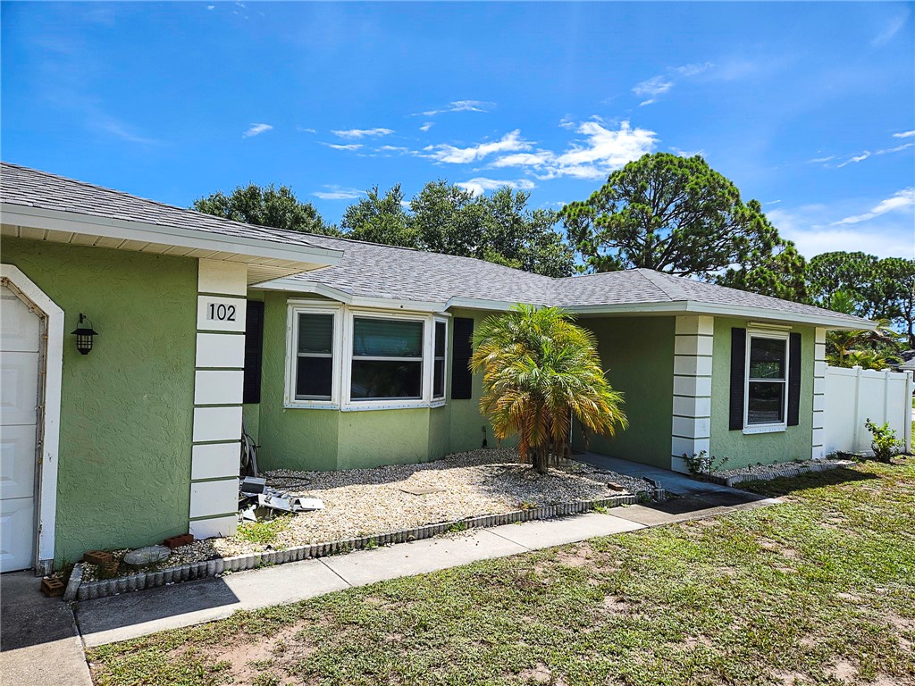 102 Cardinal Drive Sebastian, FL 32958 - Photo 1 of 34 a front view of a house