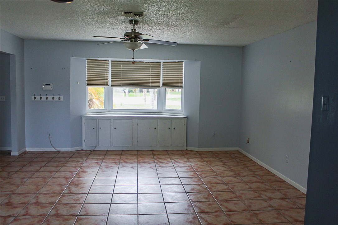 102 Cardinal Drive Sebastian, FL 32958 - Photo 15 of 34 a view of an empty room with a window