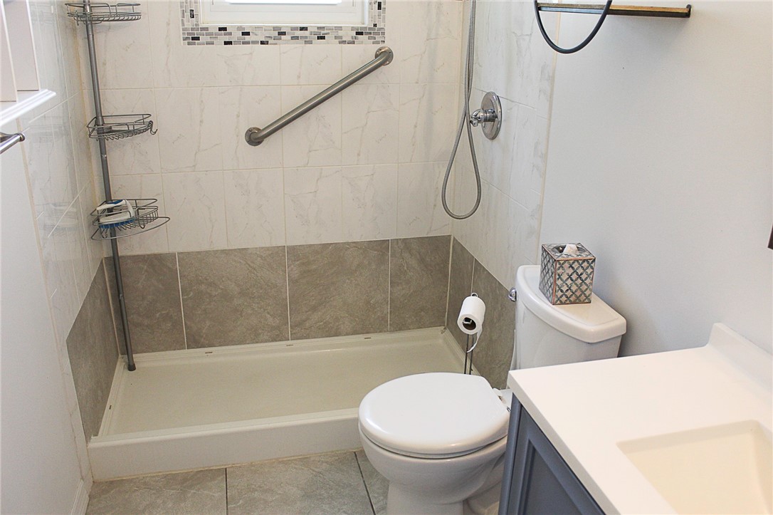 102 Cardinal Drive Sebastian, FL 32958 - Photo 27 of 34 a bathroom with a shower a toilet and a sink