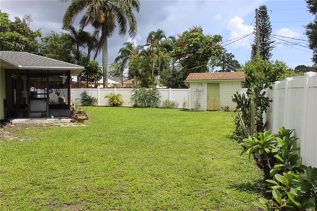 102 Cardinal Drive Sebastian, FL 32958 - Photo 9 of 34 a view of a house with a backyard