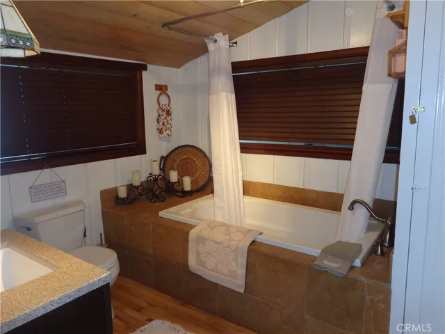 a bathroom with a sink and a bathtub