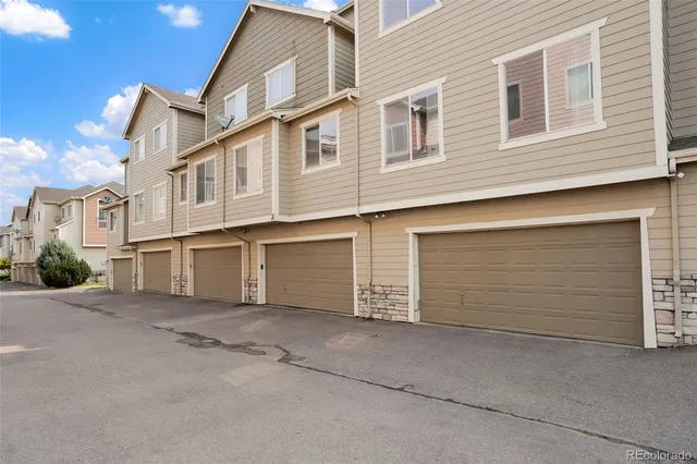 a view of a house with garage