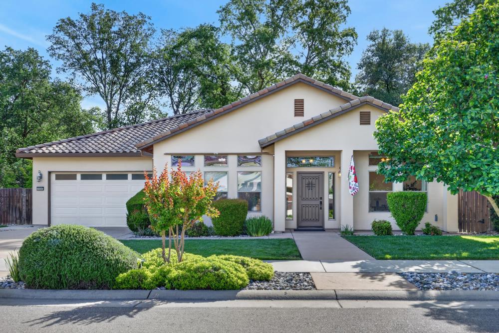 3906 Brace Ranch Road Loomis, CA 95650 - Photo 1 of 1 a front view of a house with garden