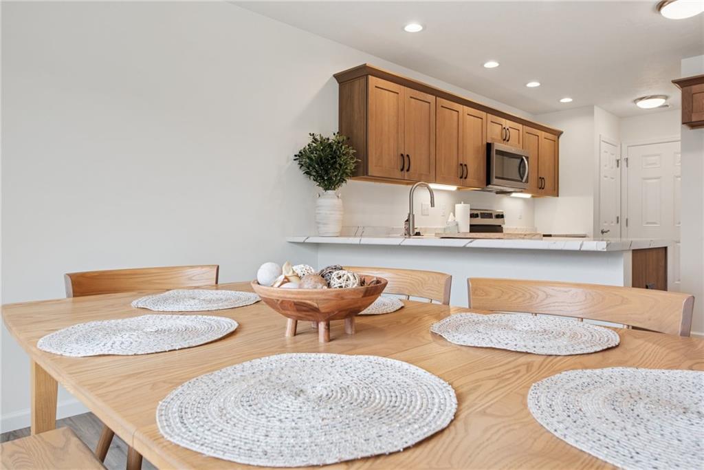 1632 Lois Road, Unit LOT 22 A Latrobe, PA 15650 - Photo 11 of 31 a kitchen with stainless steel appliances kitchen island granite countertop a sink and a white cabinets