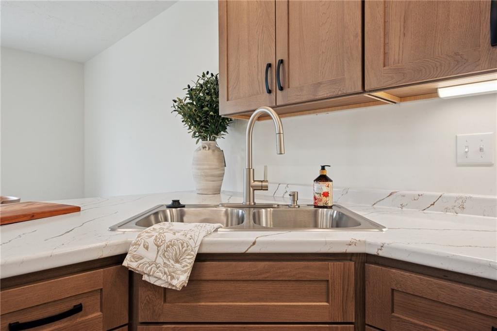 1632 Lois Road, Unit LOT 22 A Latrobe, PA 15650 - Photo 15 of 31 a kitchen with a sink and cabinets