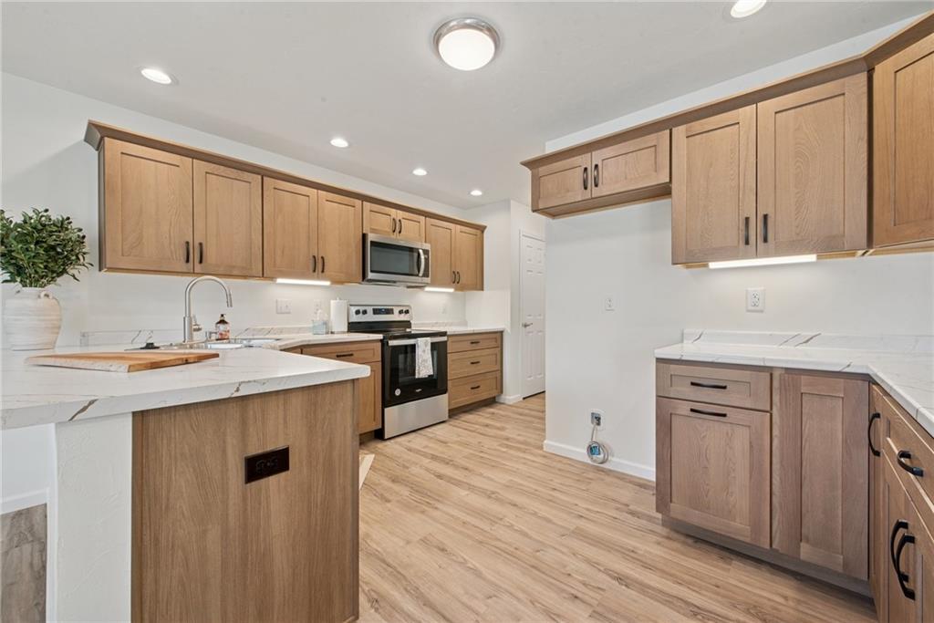 1632 Lois Road, Unit LOT 22 A Latrobe, PA 15650 - Photo 16 of 31 a kitchen with a sink window and cabinets