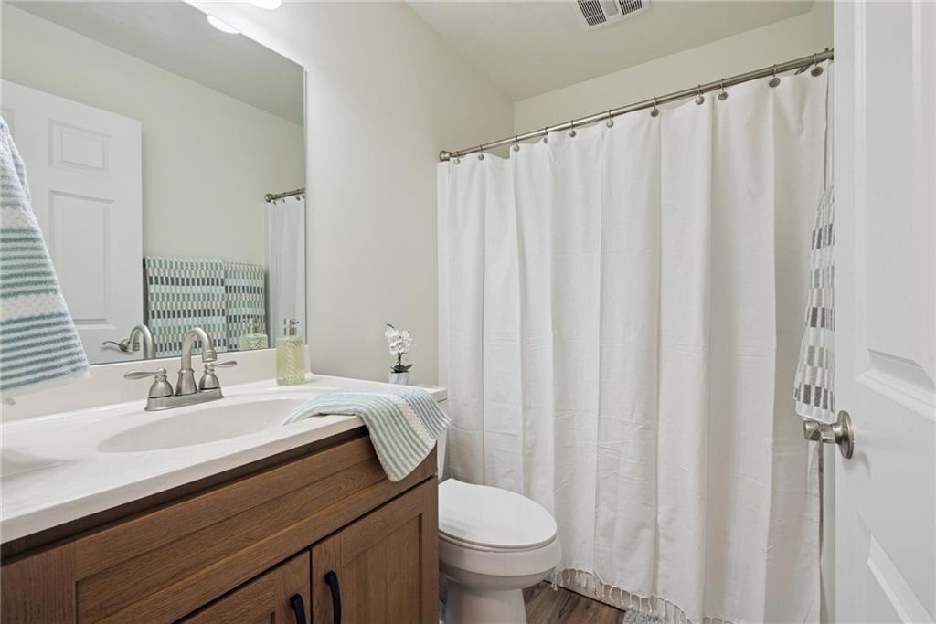1632 Lois Road, Unit LOT 22 A Latrobe, PA 15650 - Photo 19 of 31 a bathroom with a sink and a mirror