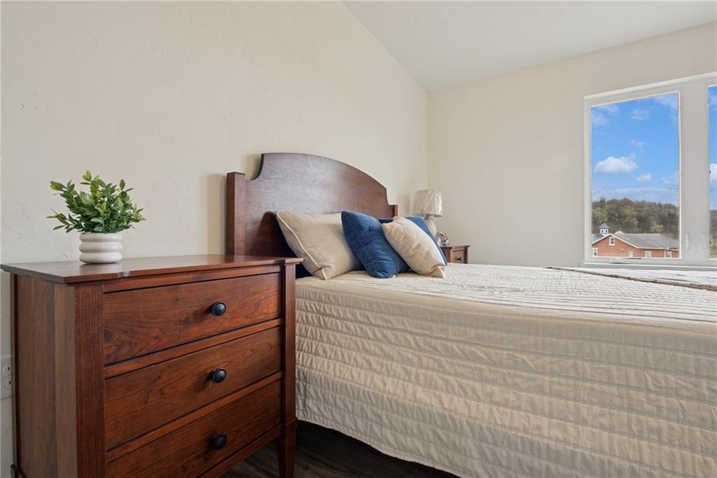 1632 Lois Road, Unit LOT 22 A Latrobe, PA 15650 - Photo 27 of 31 a bedroom with a bed and a potted plant