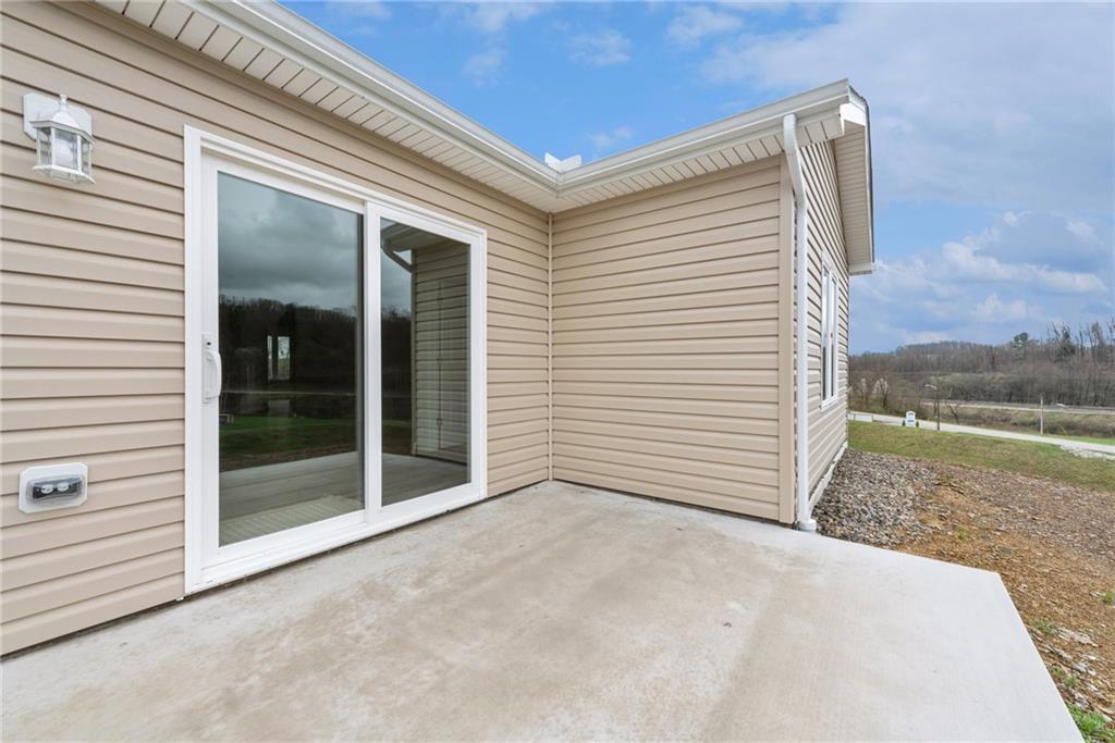 1632 Lois Road, Unit LOT 22 A Latrobe, PA 15650 - Photo 31 of 31 a view of a backyard of a house