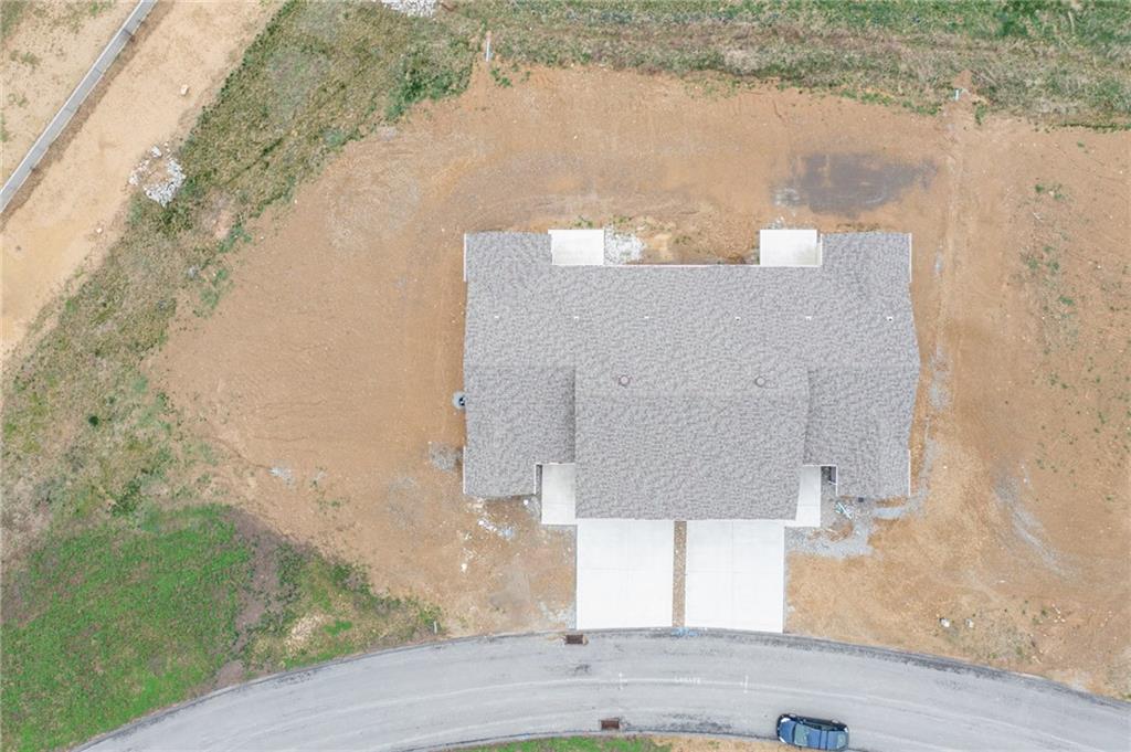 1632 Lois Road, Unit LOT 22 A Latrobe, PA 15650 - Photo 6 of 31 an aerial view of a house with a yard and lake view