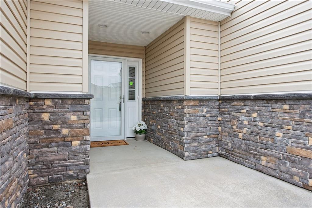 1632 Lois Road, Unit LOT 22 A Latrobe, PA 15650 - Photo 7 of 31 a brick building with a window