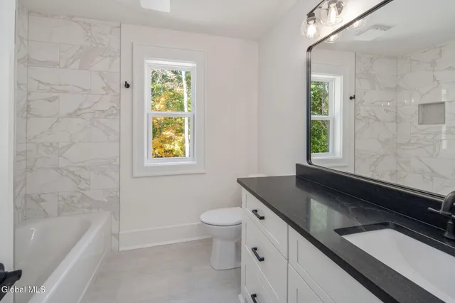 $699,000 | 24 Hill Crest Lane, Unit 7, Lake George, NY 12845