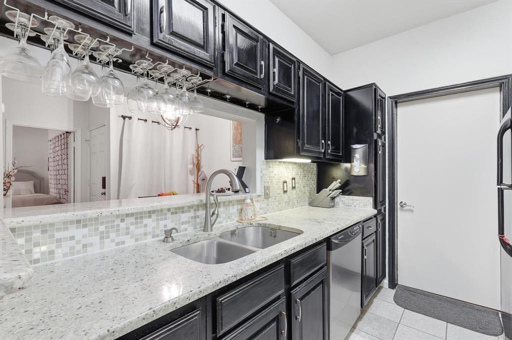 5619 Preston Oaks Road, Unit 305 Dallas, TX 75254 - Photo 11 of 35 a bathroom with a sink and a mirror