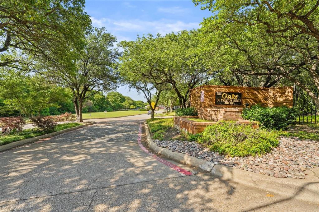 5619 Preston Oaks Road, Unit 305 Dallas, TX 75254 - Photo 2 of 35 a view of outdoor space yard and trees