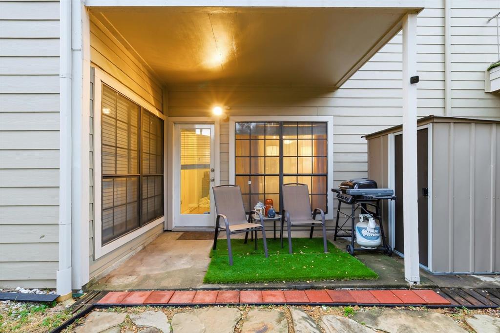 5619 Preston Oaks Road, Unit 305 Dallas, TX 75254 - Photo 24 of 35 Private Covered patio & shed in a large back yard for a condo.