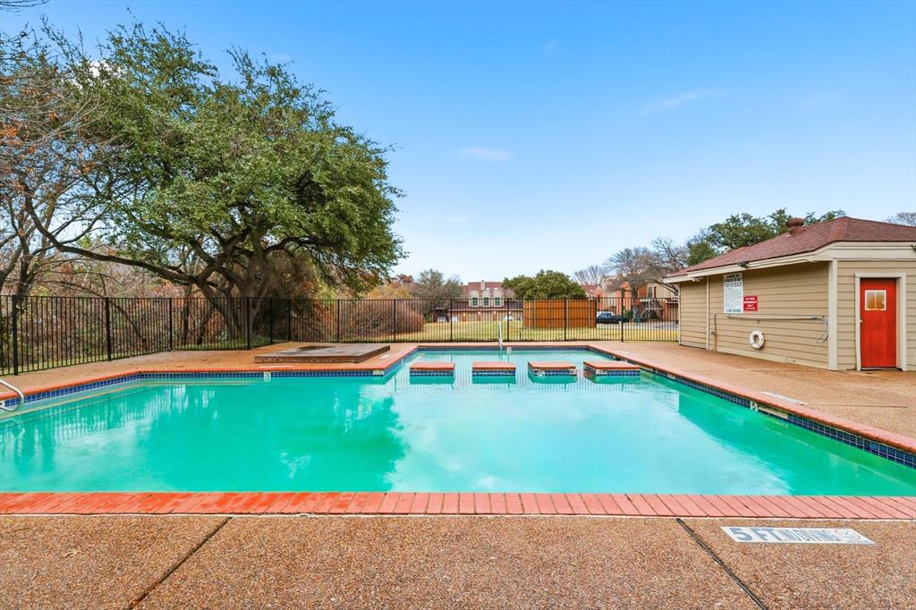 5619 Preston Oaks Road, Unit 305 Dallas, TX 75254 - Photo 33 of 35 a view of a swimming pool with an outdoor seating and yard