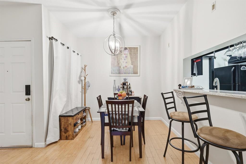 5619 Preston Oaks Road, Unit 305 Dallas, TX 75254 - Photo 6 of 35 a view of a dining room with furniture