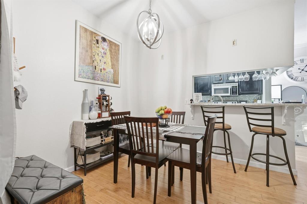 5619 Preston Oaks Road, Unit 305 Dallas, TX 75254 - Photo 7 of 35 Open, light & bright with wood floors, high ceilings & no popcorn!