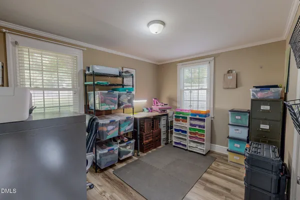 a room with furniture and a window