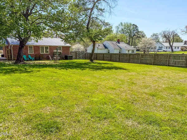 a front view of a house with a swimming pool