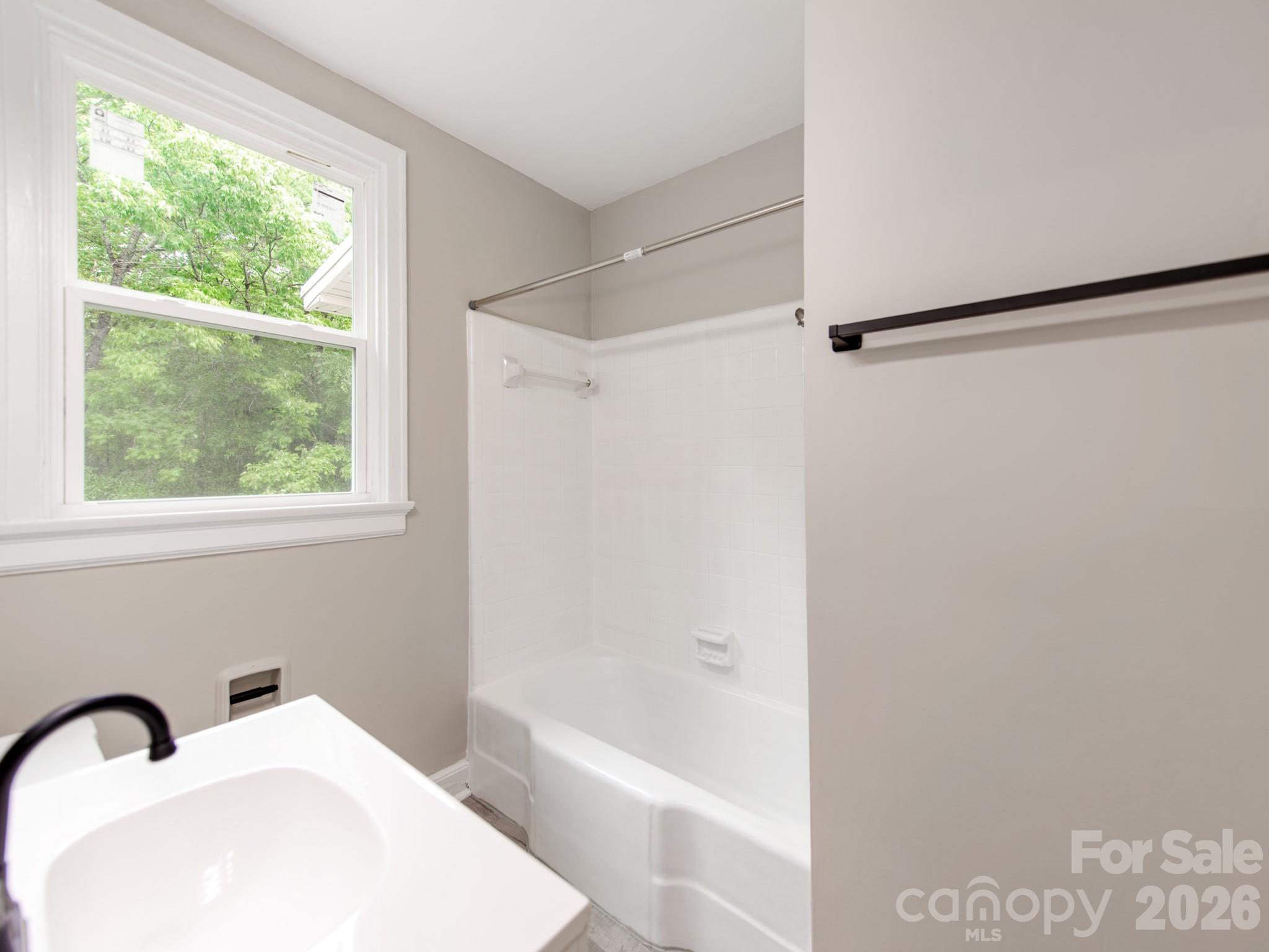 4699 Cherrystone Road Lancaster, SC 29720 - Photo 17 of 28 a bathroom with a bathtub and a shower