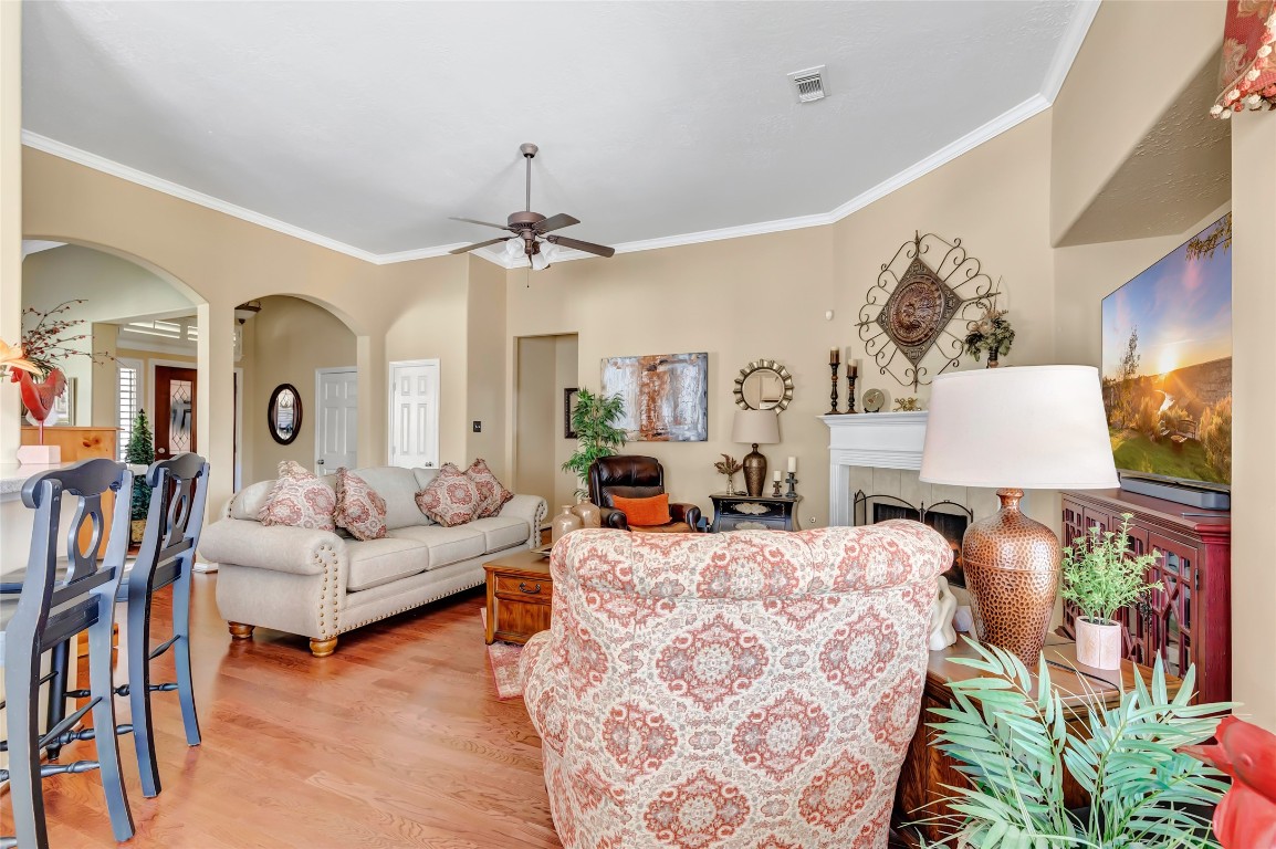 25605 Dartmaker Court Porter, TX 77365 - Photo 11 of 34 a living room with furniture and a chandelier
