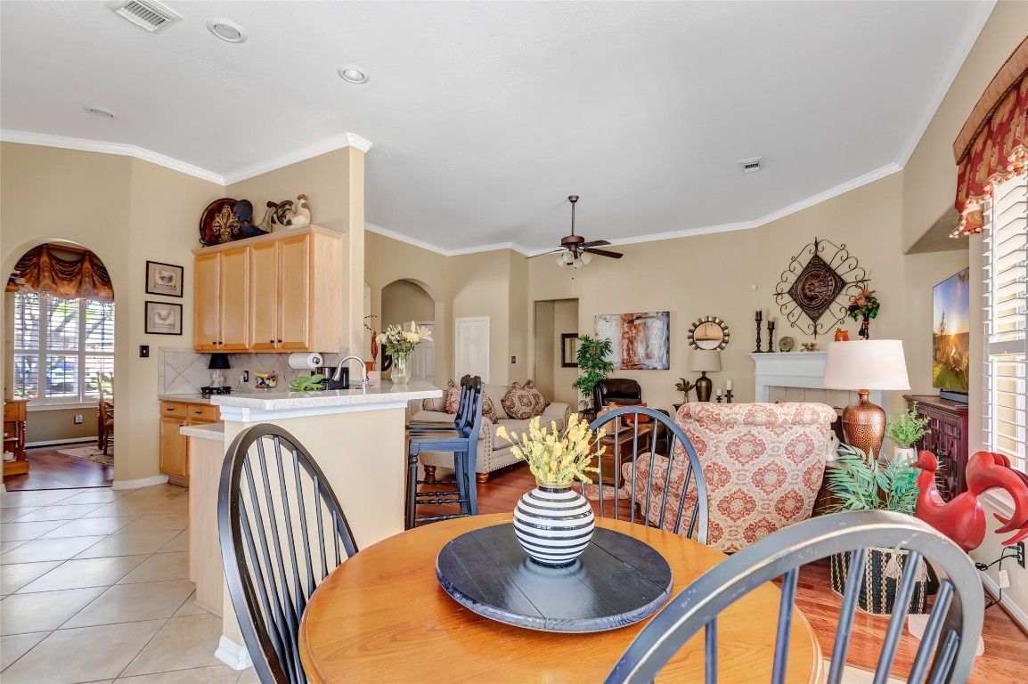 25605 Dartmaker Court Porter, TX 77365 - Photo 15 of 34 a kitchen with a dining table and chairs