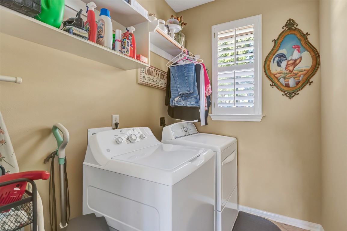 25605 Dartmaker Court Porter, TX 77365 - Photo 17 of 34 a utility room with dryer and washer