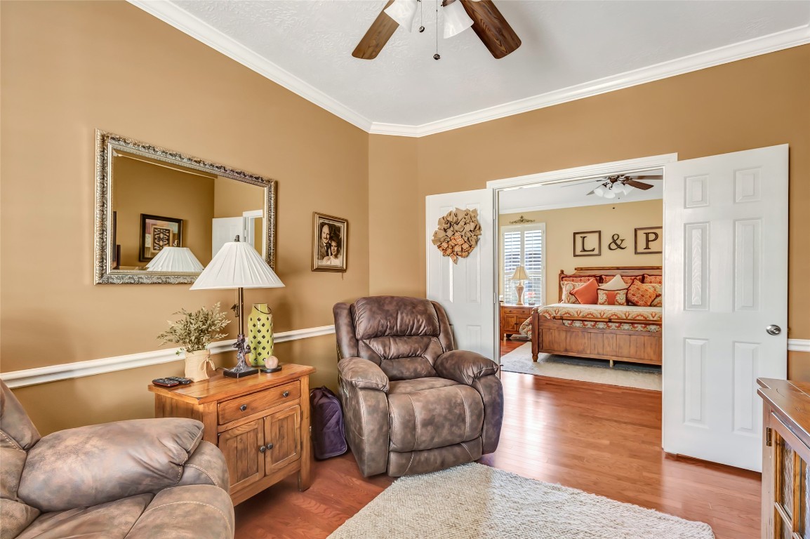 25605 Dartmaker Court Porter, TX 77365 - Photo 25 of 34 a living room with furniture and a wooden floor