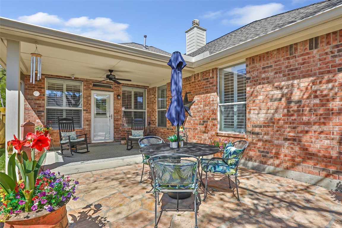25605 Dartmaker Court Porter, TX 77365 - Photo 29 of 34 a backyard of a house with outdoor seating