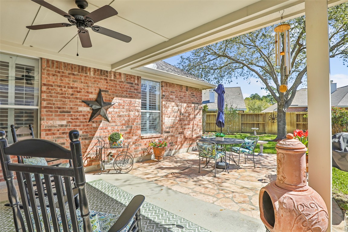 25605 Dartmaker Court Porter, TX 77365 - Photo 30 of 34 a view of a porch with furniture and backyard