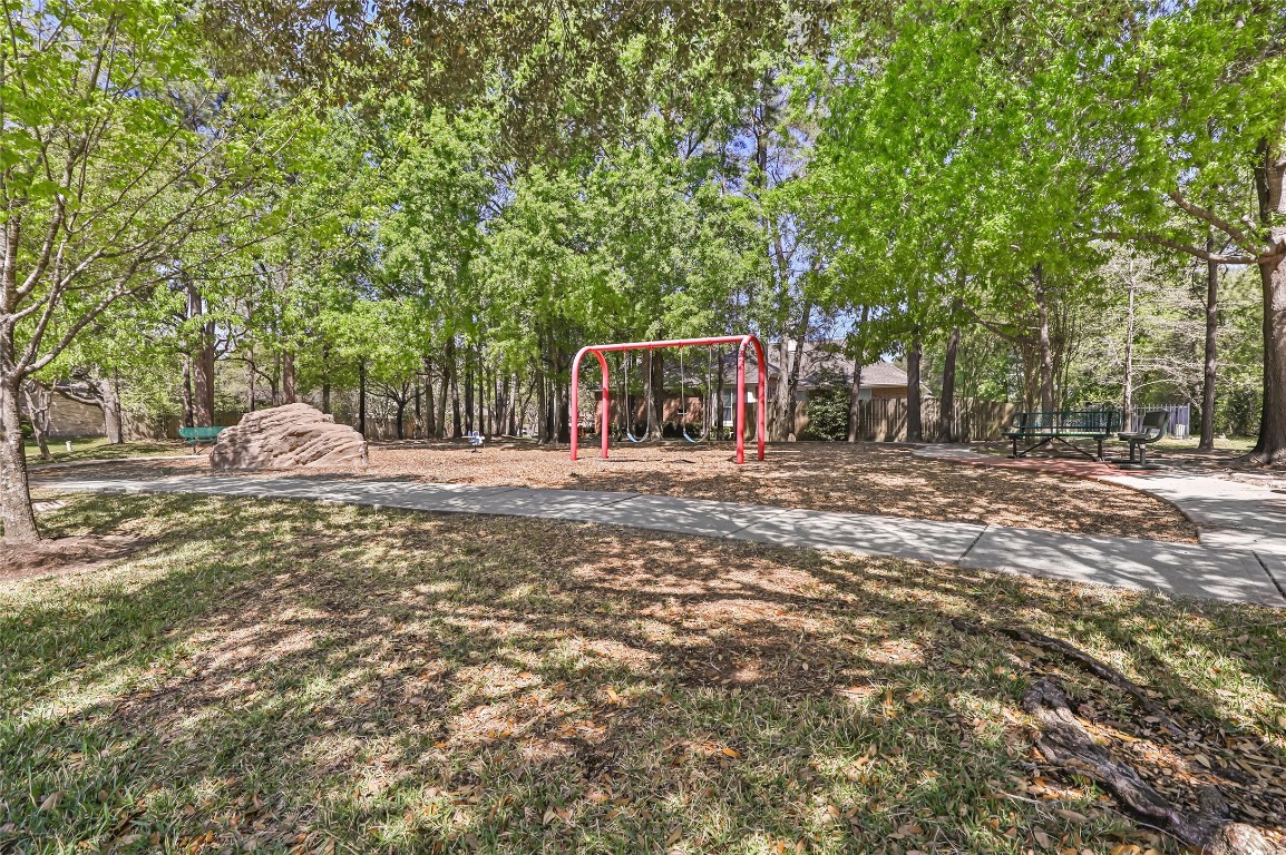 25605 Dartmaker Court Porter, TX 77365 - Photo 34 of 34 a front view of a house with a yard