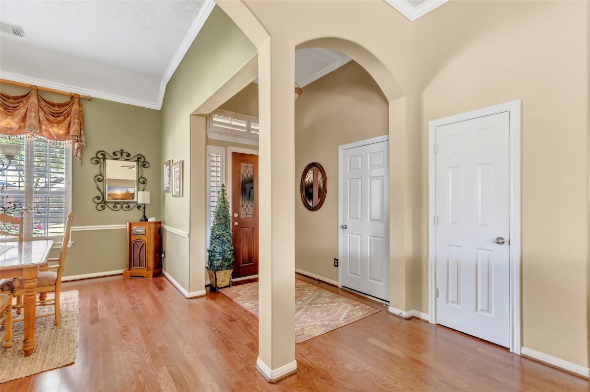 25605 Dartmaker Court Porter, TX 77365 - Photo 8 of 34 a view of livingroom with hardwood floor and a flat screen tv